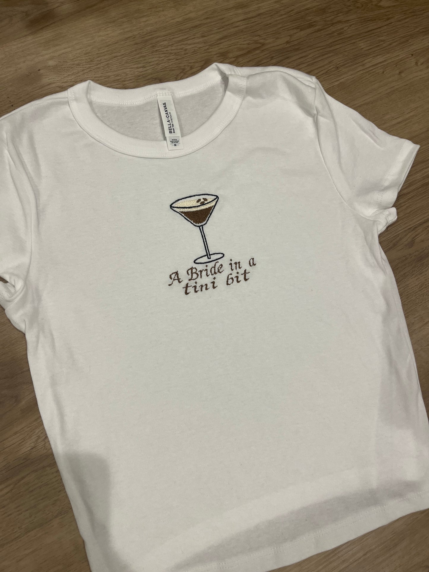 A bride in a tini bit espresso baby doll tee