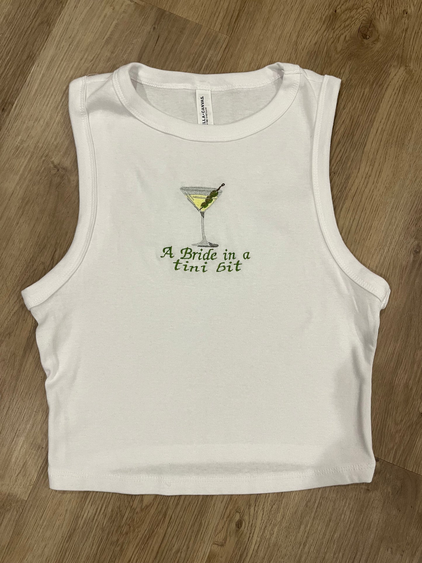 A bride in a tini bit embroidered tank top