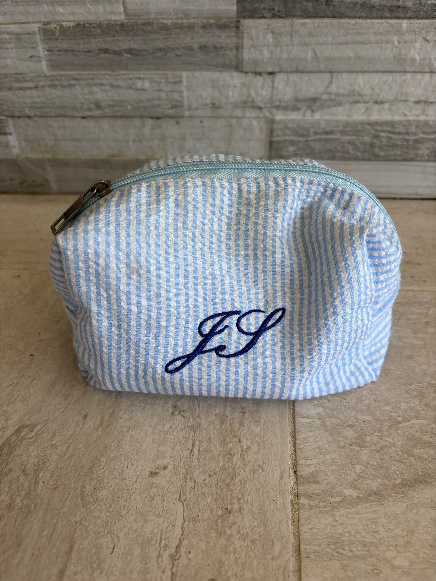 Mini striped makeup bag
