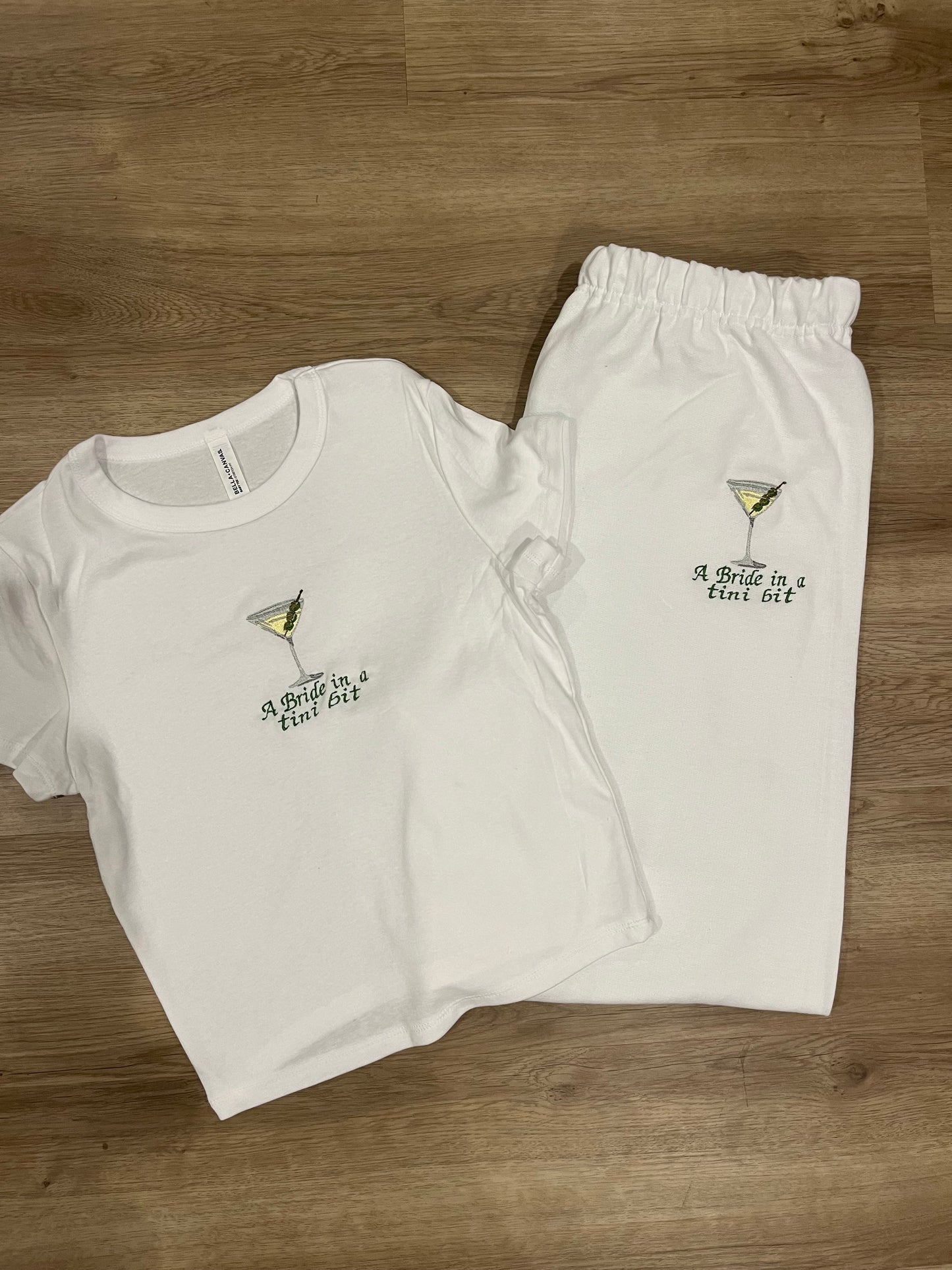 A bride in a tini bit baby doll tee with sweatpants