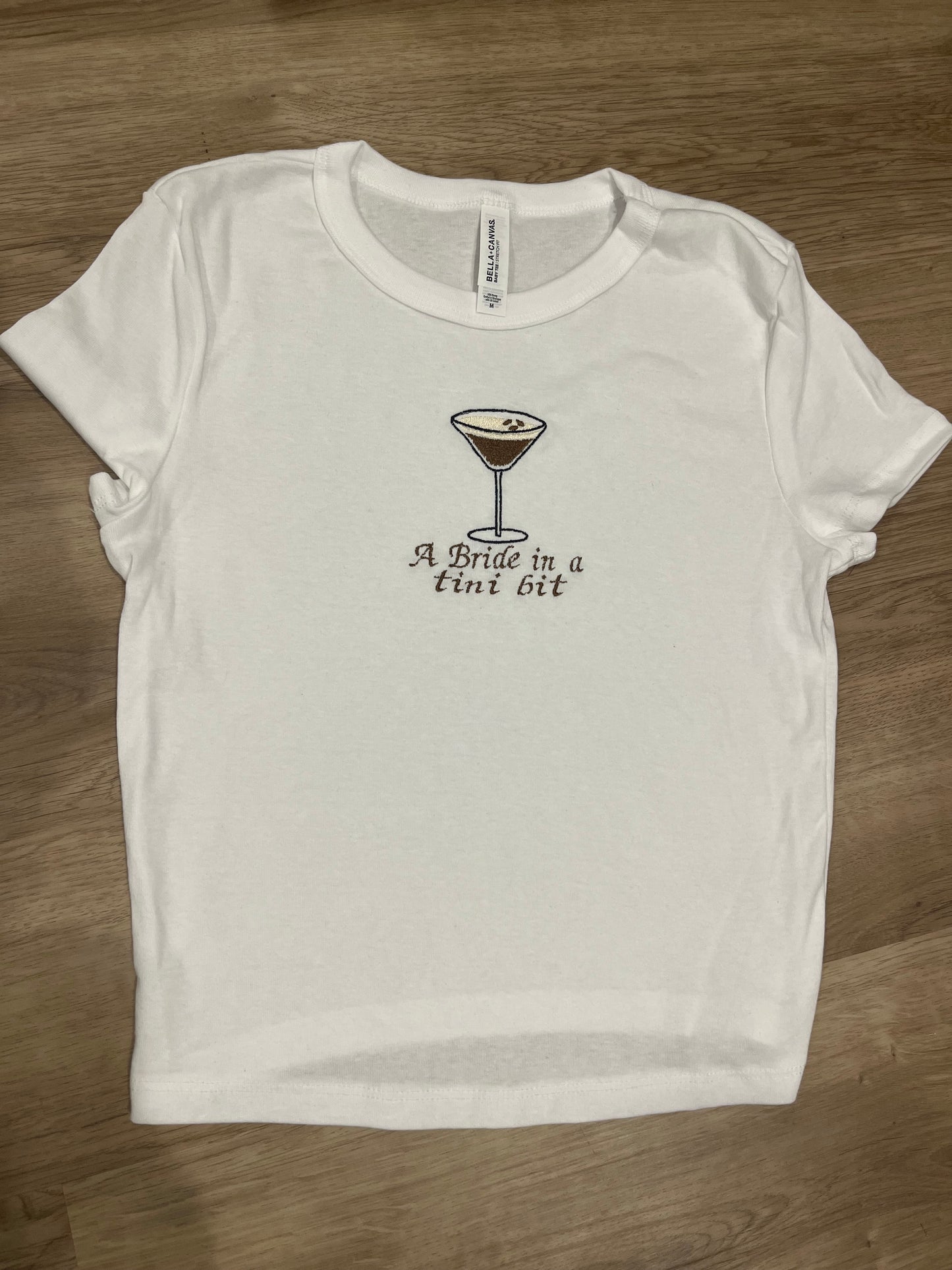 A bride in a tini bit espresso baby doll tee