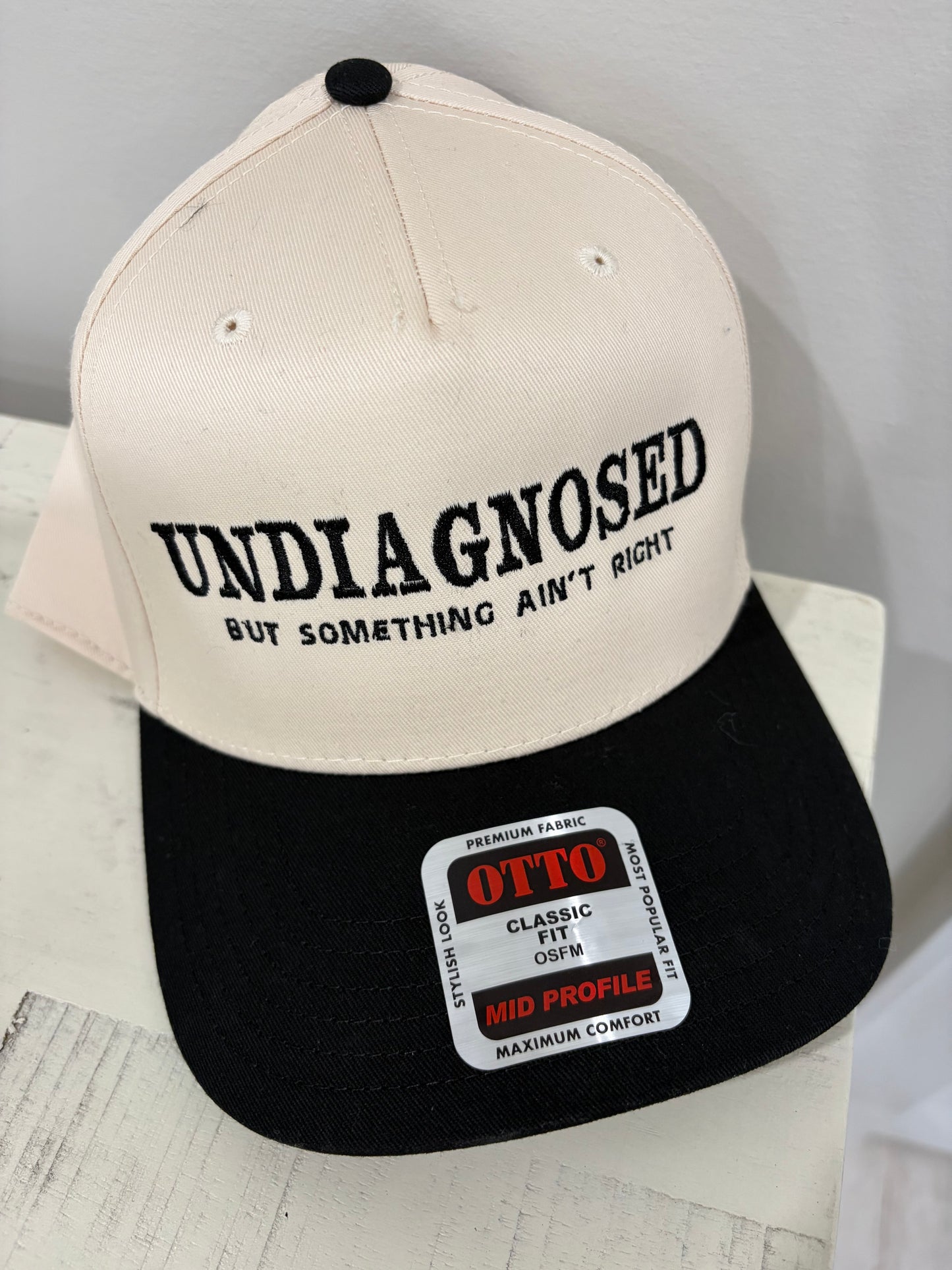 Undiagnosed embroidered hat