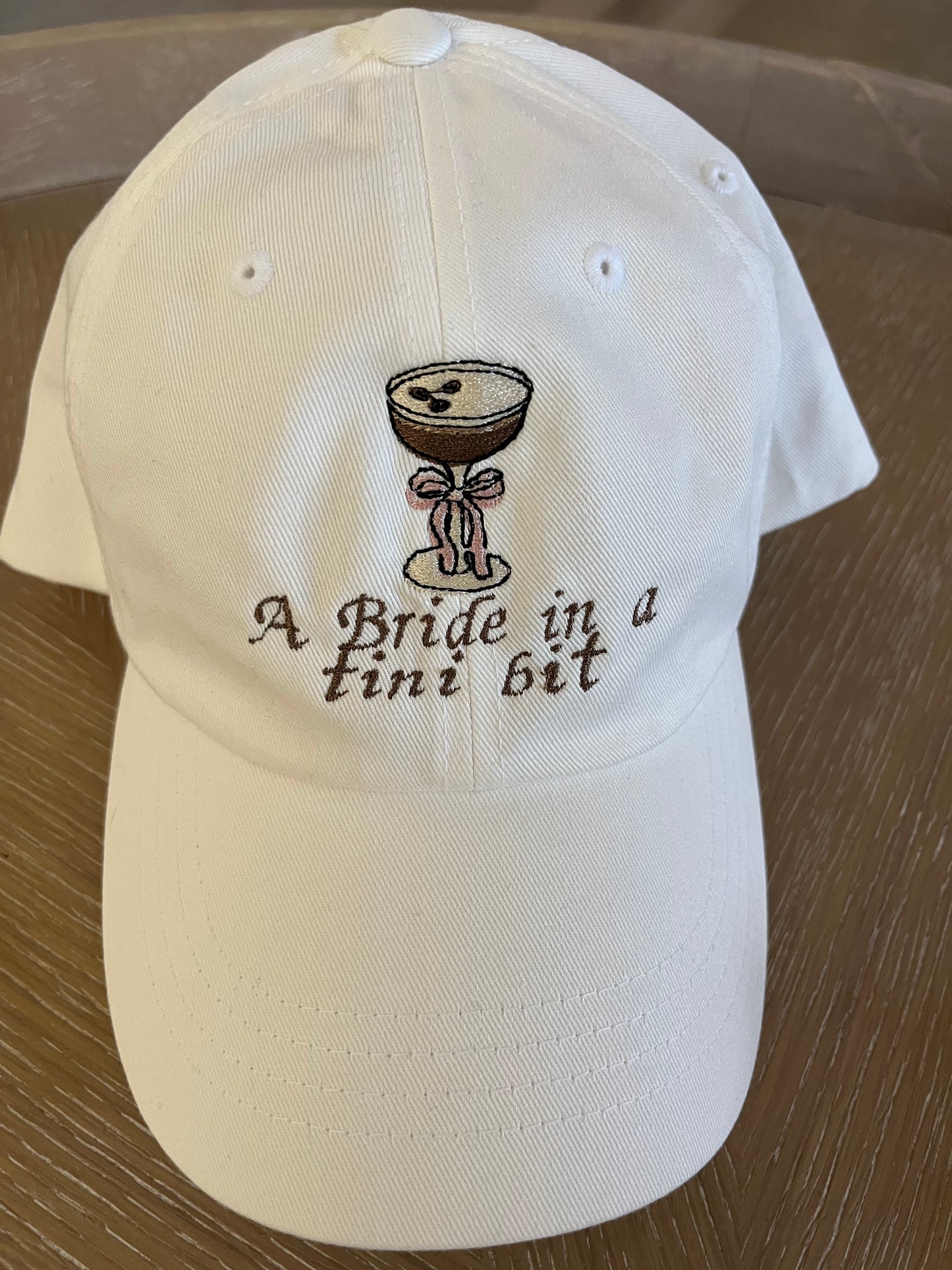 Bride in a tini bit hat