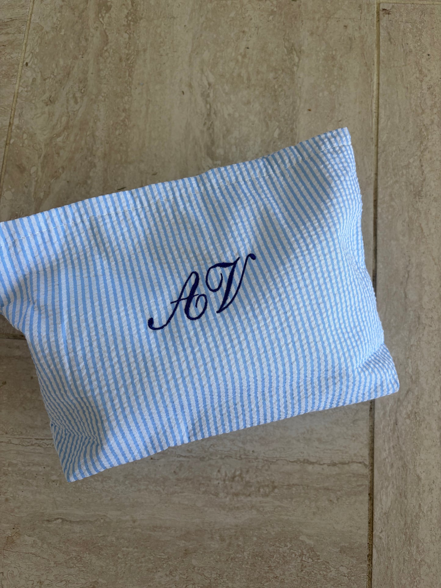Striped makeup pouch
