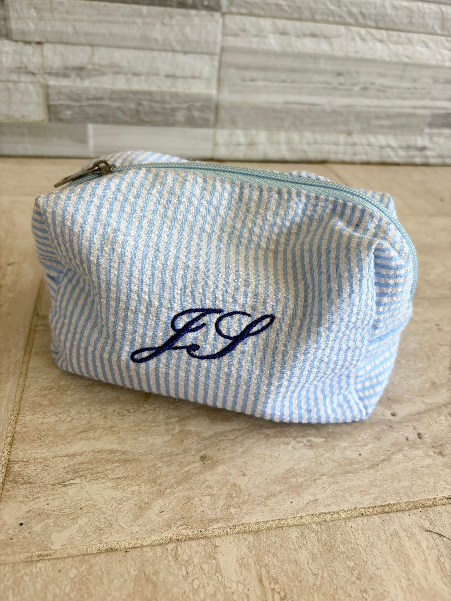 Mini striped makeup bag