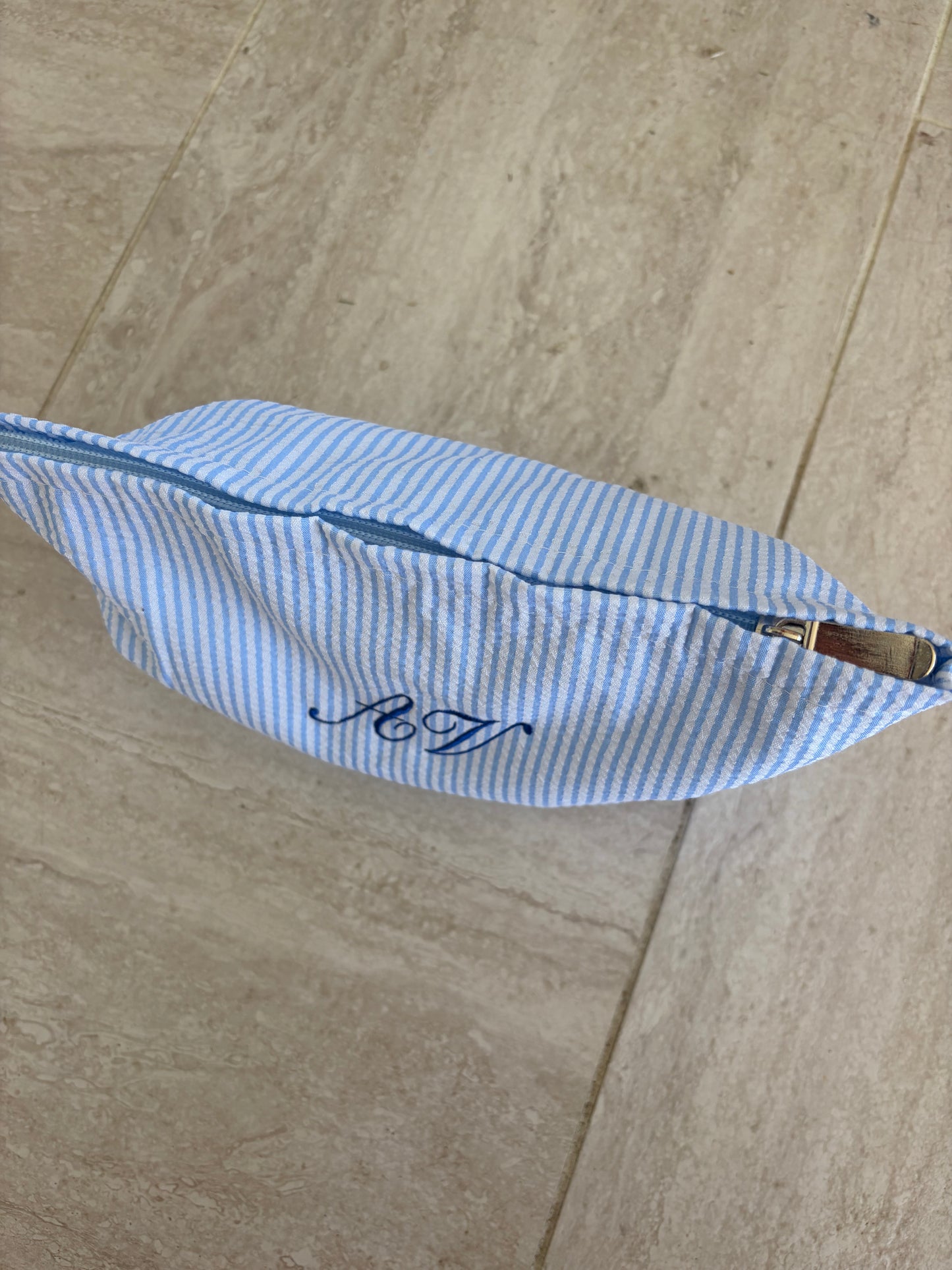 Striped makeup pouch