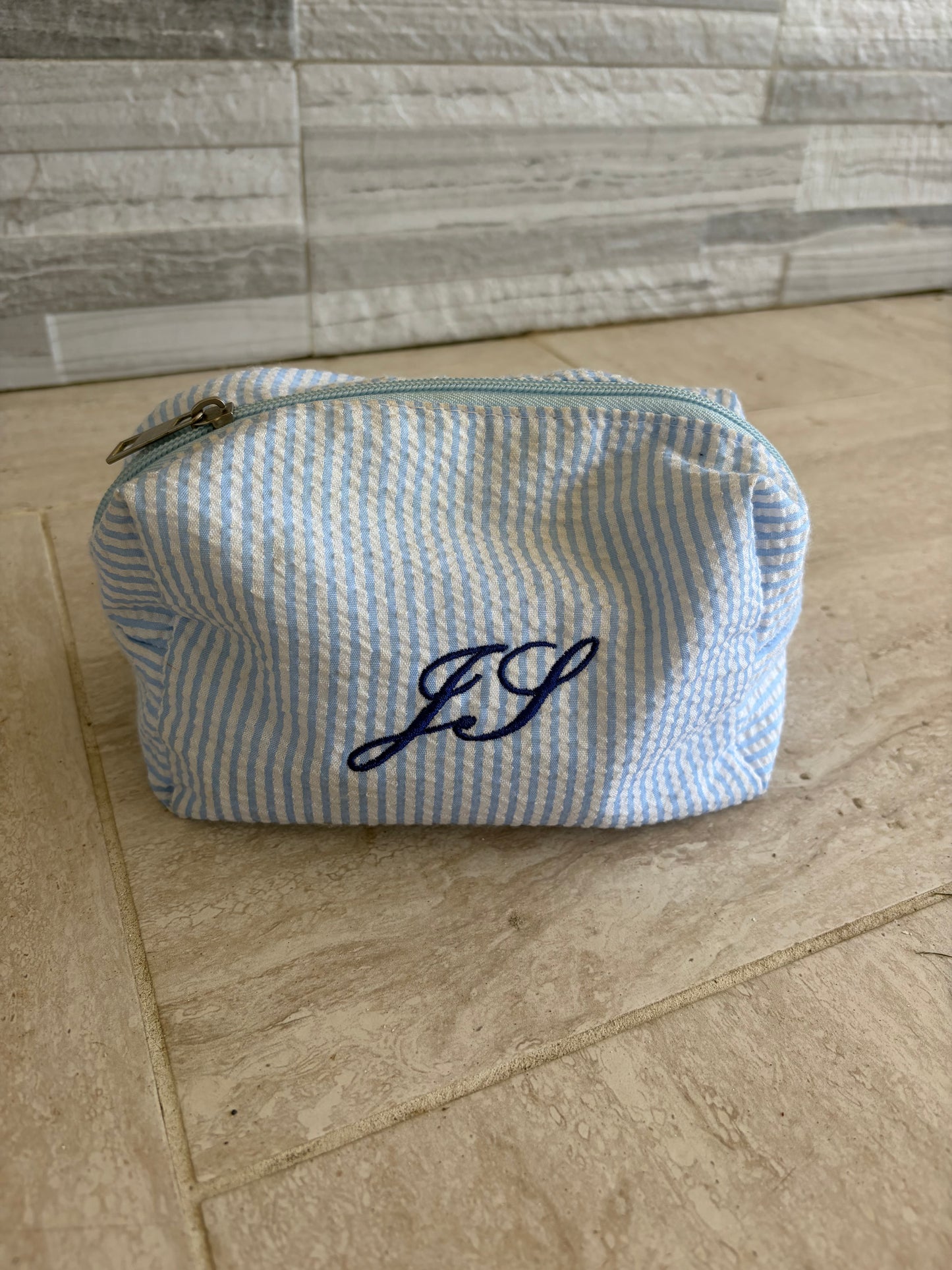Mini striped makeup bag
