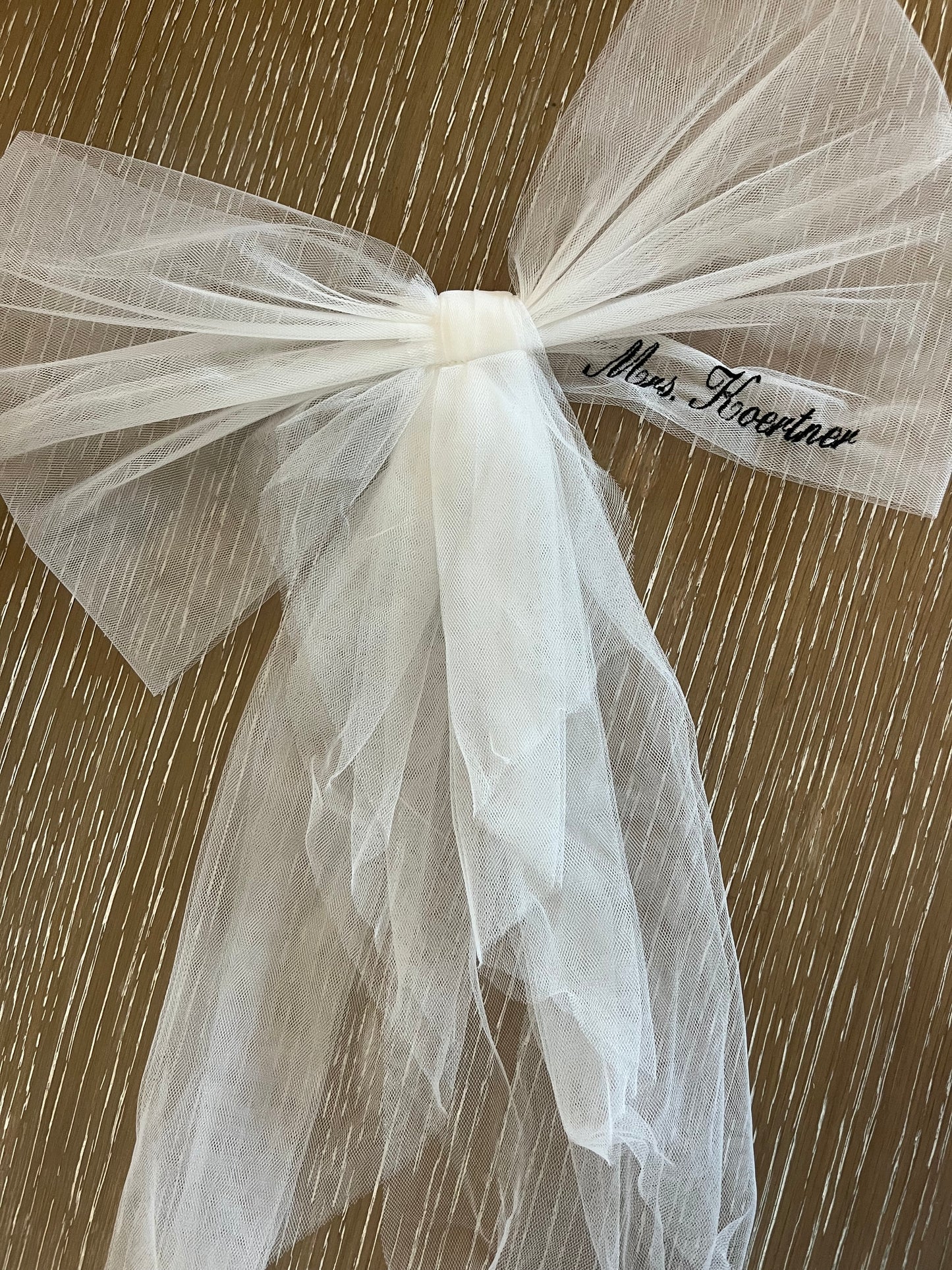 Custom embroidered bow attachment for bikini
