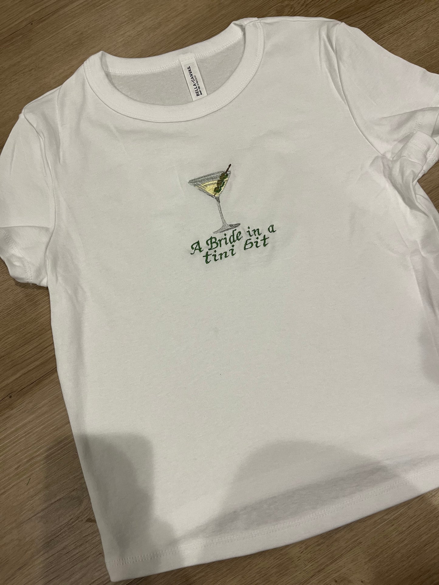 A bride in a tini bit baby doll tee