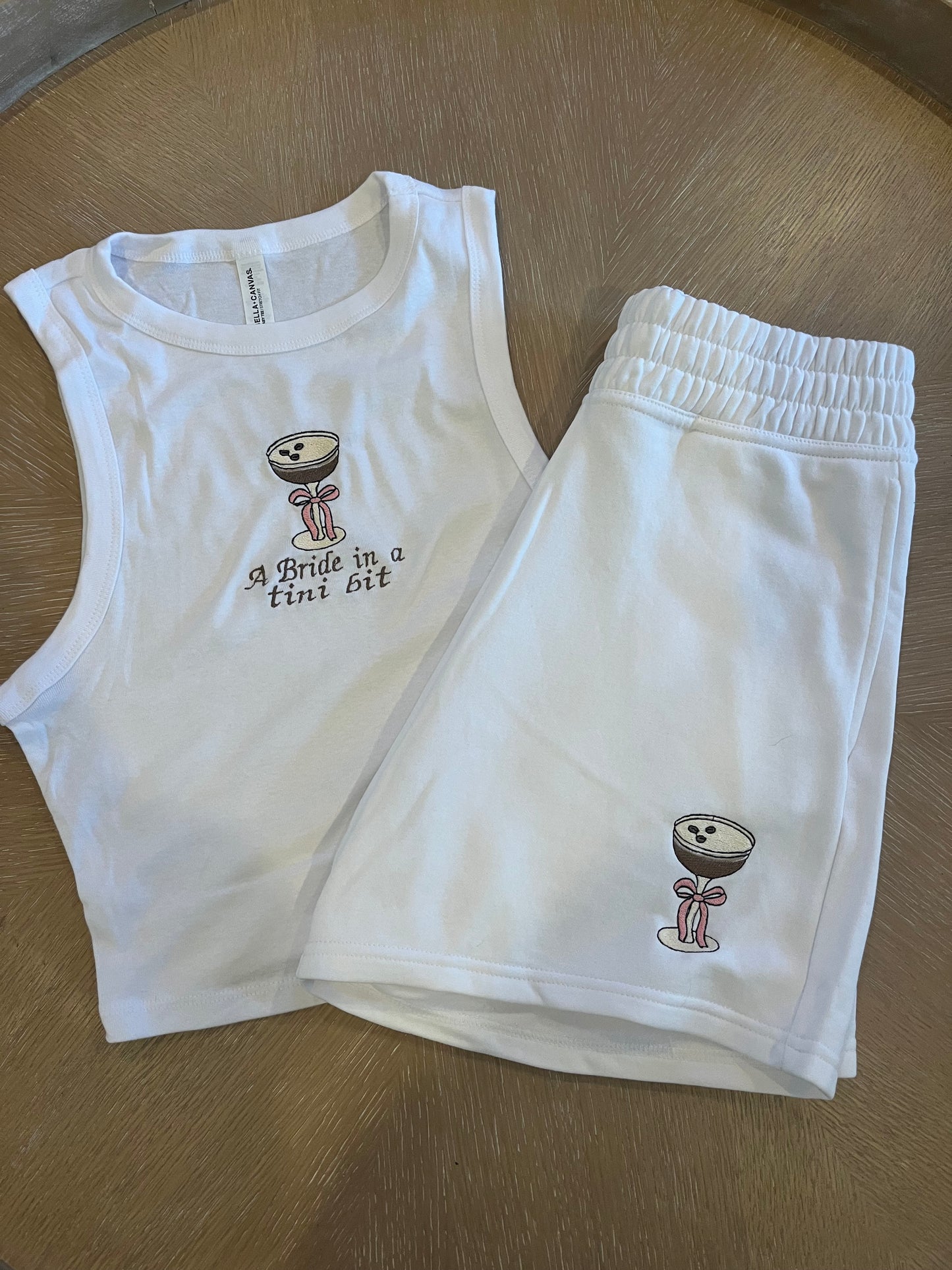 A bride in a tini bit embroidered espresso bow shorts set