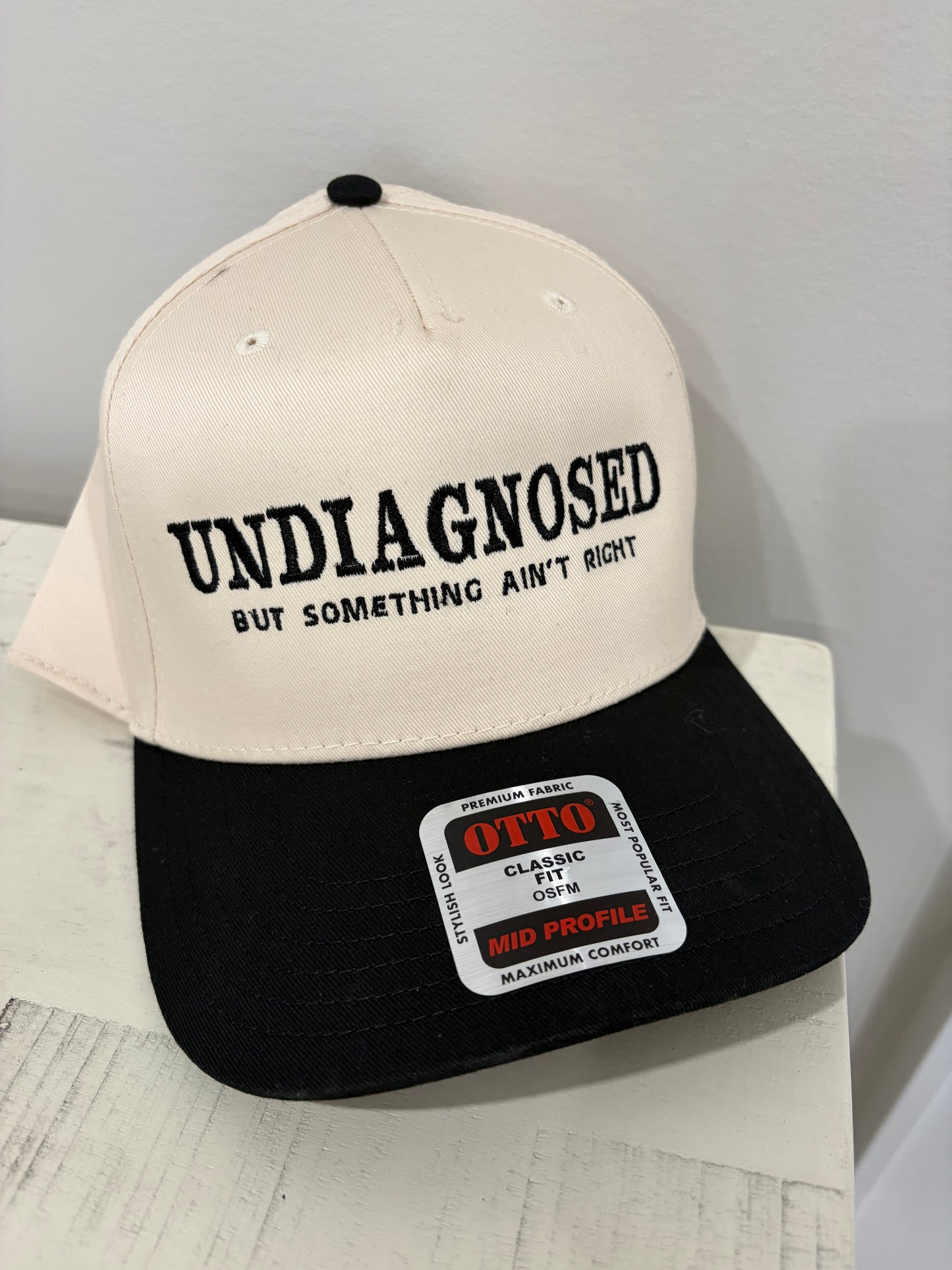 Undiagnosed embroidered hat